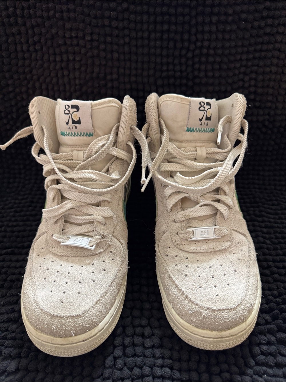 Nike Kids Beige High-Top Sneakers with Subtle Green and Black Accent